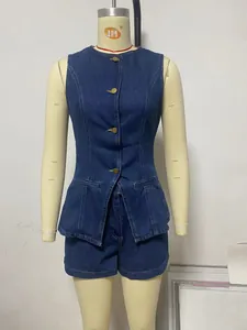 Front view of sleeveless denim peplum top and high-waisted shorts set on a mannequin.
