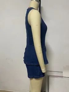 Detailed side profile of women's summer sleeveless denim peplum top and high-waist shorts set