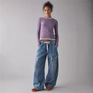 Stylish women's oversized wide-leg denim cargo pants for a relaxed streetwear look