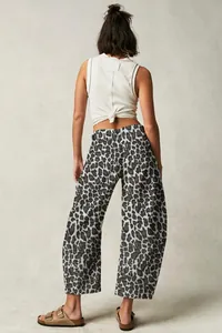 Detailed back view of stylish leopard print barrel jeans for women in a relaxed fit