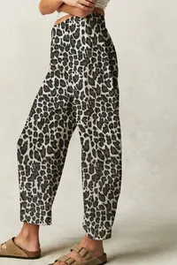 Detailed side view of high-quality leopard print loose barrel-shaped women's denim jeans
