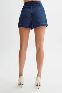 Rear view of stylish high-waisted dark blue denim shorts for summer fashion