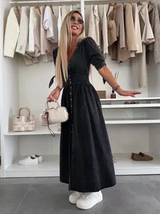 Elegant black denim V-neck button-down maxi dress with stylish puff sleeves for women