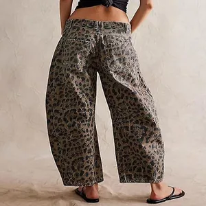 Detailed back view of leopard print barrel leg denim jeans for a trendy autumn look