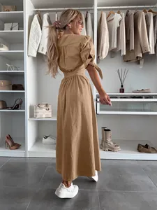 Elegant camel long button denim dress with V-neck, puff sleeves and tied cuffs design