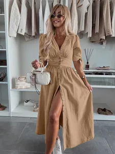 Khaki button-down denim maxi dress with V-neck and puff sleeves shown in a closet setting