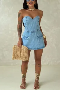 Detailed view of light blue denim strapless tube romper with heart-shaped neckline