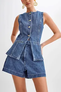 Detailed view of western style sleeveless denim vest and high-waisted shorts set.