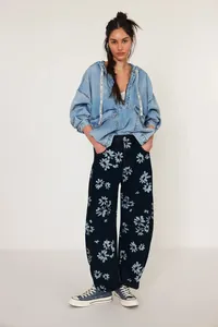 Stylish women's floral print barrel jeans in navy blue denim with a relaxed loose fit