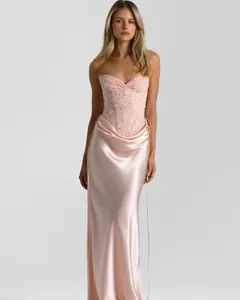 Elegantly detailed pink strapless evening gown featuring a sequined bodice and satin skirt