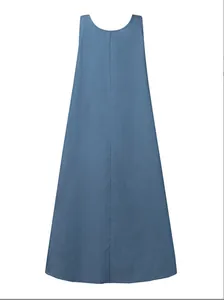 Back view of a vintage long blue denim pinafore dress with a loose A-line silhouette