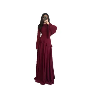 Elegant burgundy long sleeve maxi dress with ruffled waist detail for autumn.