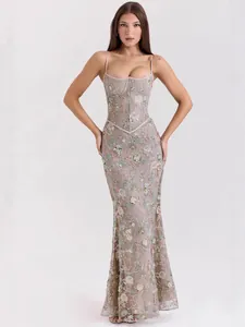 Elegant floral embroidered evening gown with structured corset bodice and thin spaghetti straps