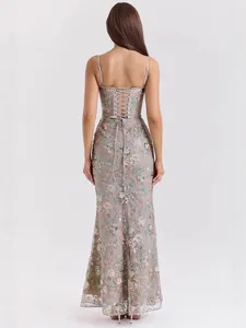 Elegant floral sequin maxi dress with a lace-up back and thin spaghetti straps