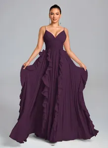 Elegant dark purple pleated evening gown with ruffle detail and spaghetti straps