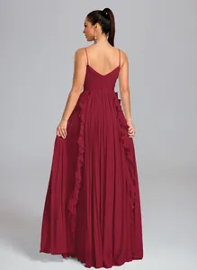 Elegant burgundy backless pleated maxi dress featuring delicate ruffle details on the back.