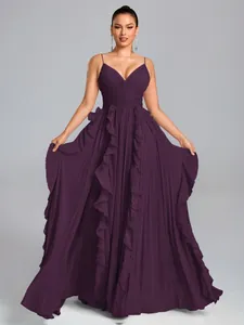 Elegant deep purple pleated evening gown with ruffle details and spaghetti straps