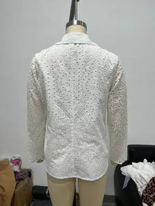 Back view of a white eyelet hollow-out jacket for women with intricate floral patterns