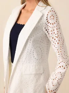 Elegant white eyelet lace blazer for women with a slim fit and floral hollow-out pattern.