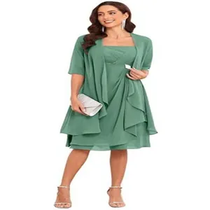 Full view of the sage green strapless dress ensemble featuring a matching shawl