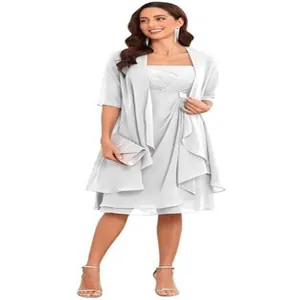 Elegant silver strapless evening dress featuring matching sheer shawl and ruffled hemline