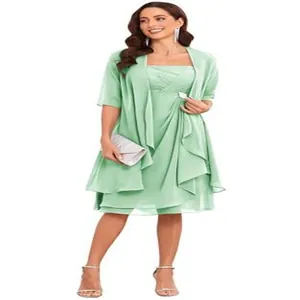Elegant mint green two-piece strapless evening dress with matching chiffon shawl