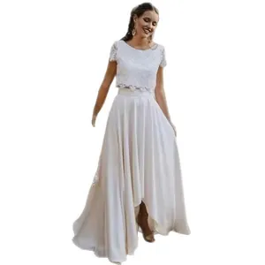 Elegant two-piece white lace top and satin skirt bridal gown for outdoor lawn weddings