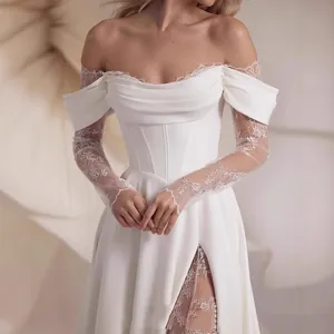 Elegant off-the-shoulder light wedding dress with lace sleeves and high slit