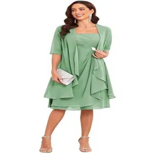 Sage green cocktail dress set with matching short-sleeved wrap and elegant layered hem