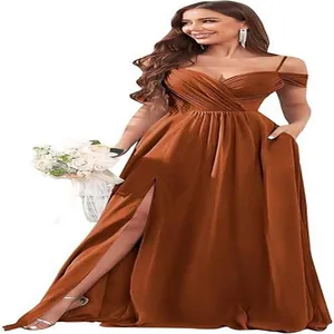 Detail showing off-shoulder neckline and pleated bodice of rust satin bridesmaid gown