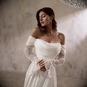 Elegantes weißes Hochzeitskleid im französischen Stil mit langen Ärmeln aus Spitze
