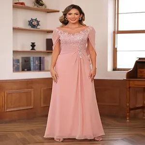 Elegant pink lace chiffon evening gown with intricate appliqué and cape sleeves for prom