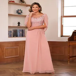 Elegant pink chiffon evening dress with lace bodice and cape sleeves for formal events