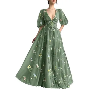 Elegant green V-neck prom dress with floral embroidery and puff sleeves in a full view