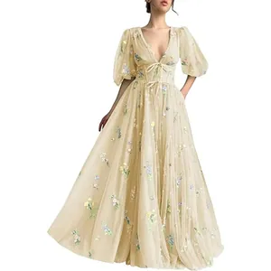 Full view detail of elegant floral embroidered tulle gown with V-neck and puff sleeves