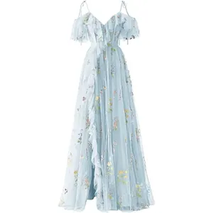 Elegant full view of light blue evening dress featuring delicate floral embroidery and ruffles