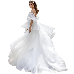 Elegant French style white wedding dress with off-shoulder puff sleeves and long train