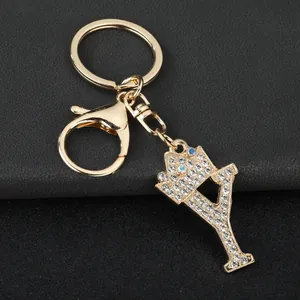 Elegant gold-plated zinc alloy letter Y keychain with sparkling rhinestones and crown