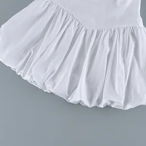 Detail of elegant white pure cotton high waist bubble skirt with pleated hem design