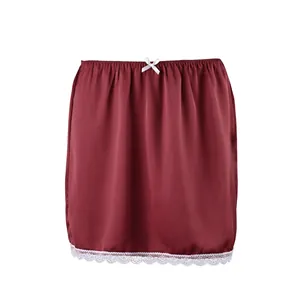 Elegant burgundy high-waist satin skirt featuring white lace trim and bow accent