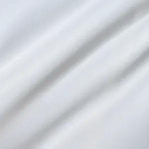 Detailed macro view showing the soft texture and weave of premium white semi-sheer fabric