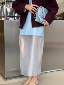 Elegant high-waisted sheer midi skirt with light blue transparent panel for women