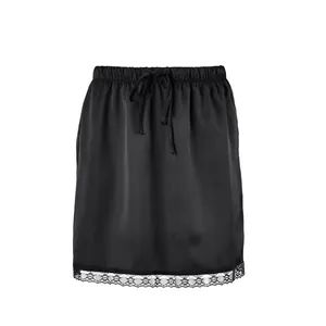 Detail view of a black satin mini skirt featuring delicate lace trim and drawstring waist