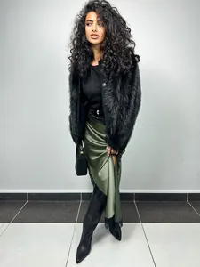 Elegant olive green asymmetrical satin skirt featuring delicate black lace trim for women