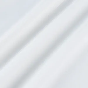 Detailopname van hoogwaardige witte twill stoftextuur voor elegante jurken