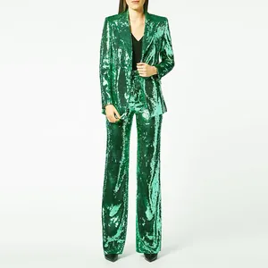 Full length view of elegant emerald green sequin blazer and wide leg trousers suit set