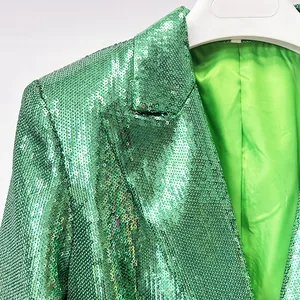 Detailed close-up of the shimmering green sequins on the lapel of this elegant suit blazer