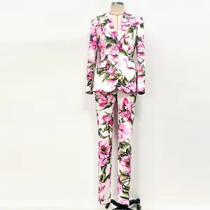 Full-length view of floral print blazer and slim-fit trousers on a mannequin