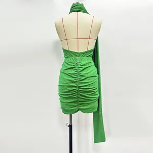 Detailed back view of sexy green rhinestone halter top and ruched skirt two-piece set