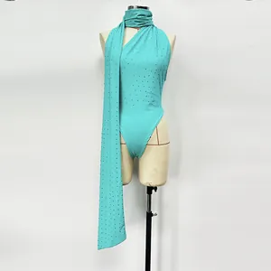 Elegant turquoise knit bodysuit set with shimmering rhinestones and matching long neck scarf.
